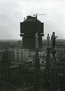 The tower during construction, seen from the Duomo of Milan