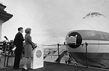 January 15, 1970: First Lady Pat Nixon christens the new Boeing 747 "jumbo jet" Pat Nixon christens Boeing 747 2749-18.jpg