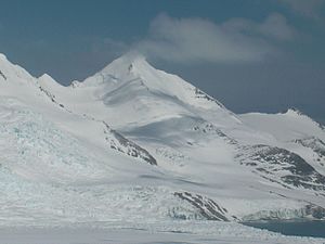 View from the shores of False Bay over the Peschtara Glacier to MacKay Peak