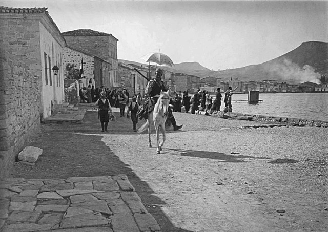 Turkish Cretan irregulars with booty, while some buildings of Old Phocaea are in flames and the Greeks await for departure, picture taken by archaeolo
