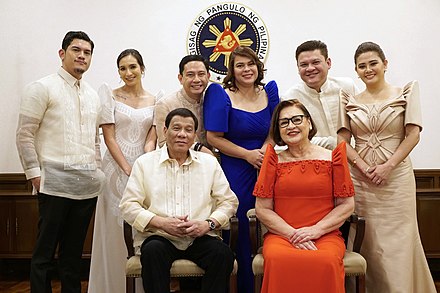 Duterte (seated, left) with his first family after delivering his 3rd State of the Nation Address in 2018