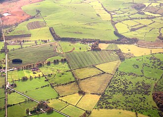 Aerial view of Priddy Circles, with the Priddy Nine Barrows and Ashen Hill Barrow Cemeteries in the distance. Priddy circles.jpg