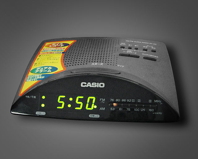 A bedside clock radio that combines a radio receiver with an alarm clock