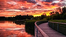 Rouge National Urban Park forms the easternmost portion of Toronto's waterfront. Rouge Beach Pond Boardwalk sunrise.jpg