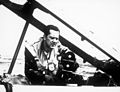 SSgt Robert E. Williams, Eureka, CA, U.S. Far East Air Forces cameraman serving with a combat-camera unit, mounts and checks his movie-camera before taking off in this T-33 jet plane HF-SN-98-07317.jpg