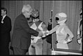 Speaker of the House Newt Gingrich shaking hands with the Pink Power Ranger.jpg