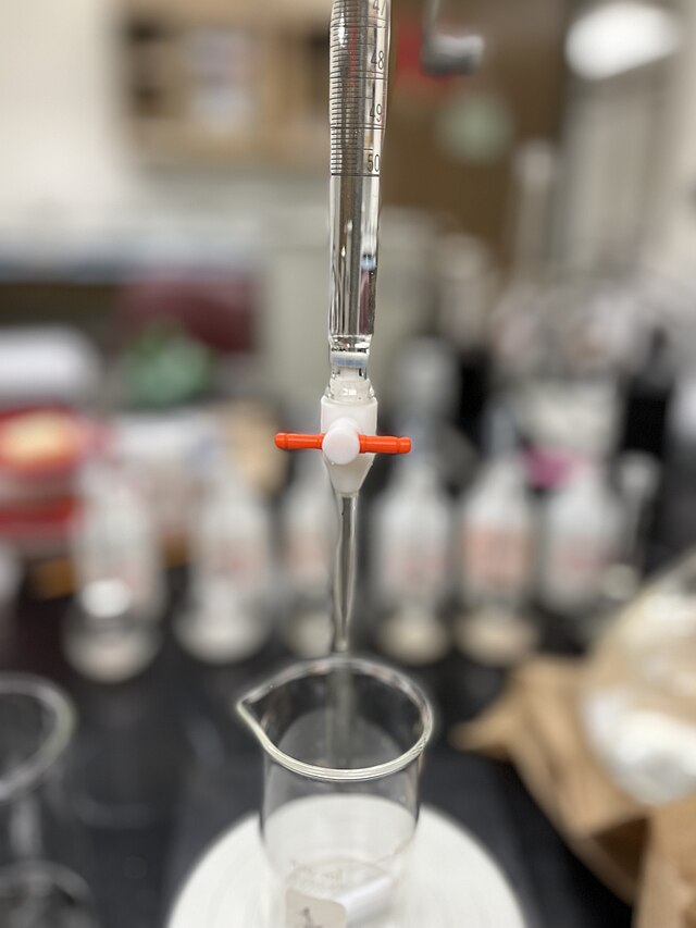 an image showing the bottom of a burette, showing the tap