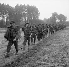 Men of the 10th Highland Light Infantry during Operation Epsom, 26 June 1944. The British Army in Normandy 1944 B5986.jpg