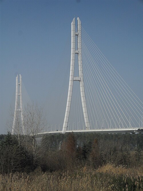 The expressway crosses the Yangtze River over the Third Nanjing Yangtze Bridge