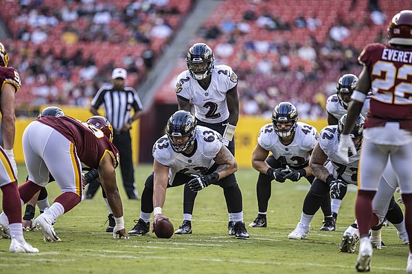 Fullback Patrick Ricard (No. 42) of the Baltimore Ravens lines up behind quarterback Tyler Huntley during a 2021 preseason game.