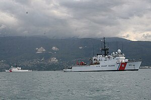 Two US Coast Guard 270-foot cutters sit offshore of Haiti, ready to provide humanitarian aid to the earthquake-ravaged country. However, they had no place to dock since the port was inoperable