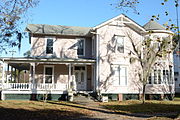 House on Union Street in Brunswick, Georgia, US. Part of the Brunswick Old Town Historic District on the National Register of Historic Places This is an image of a place or building that is listed on the National Register of Historic Places in the United States of America. Its reference number is 79000727.