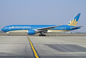 Vietnam Airlines Boeing 777-200ER in new livery at Hanoi.jpeg