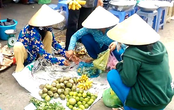 3 Vietnamese women at market