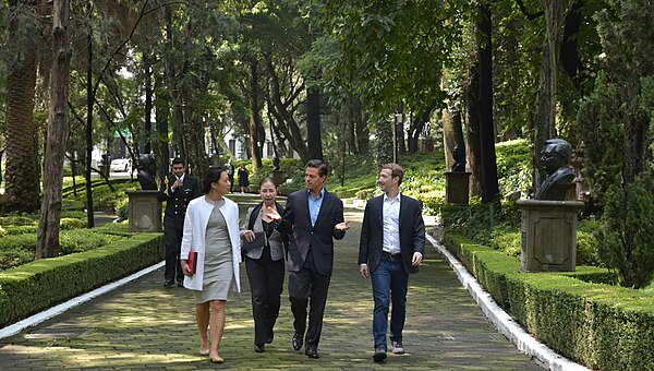 Mark Zuckerberg and Priscilla Chan in the gardens of Los Pinos during a visit in September 2014.