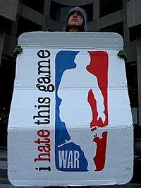 A piece of protest art featuring a parody of the logo of the NBA. WarProtestSign.jpg