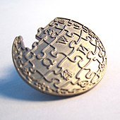 A Wikipedia lapel pin Wikipedia Globe Pin.jpg