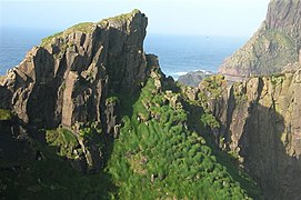 Glyvrarbergsgjógv, south of Ásmundurstakkur, west of Sandvík.