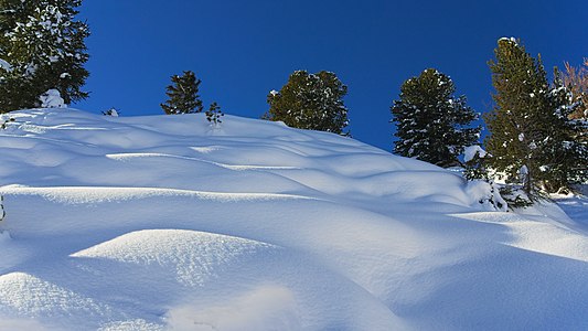 Paradiski, untouched snow. Taken in La Plagne, ski slope under lift Colorado, Savoie, France.