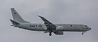 A US Navy P-8 Poseidon, tail number 168429, on final approach at Kadena Air Base in Okinawa, Japan.