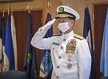 Vice Admiral Mustin salutes during the U.S. Navy Reserve change of command ceremony on August 7, 2020. 2020 Chief of Navy Reserve Change of Command 200807-N-GB595-0047.jpg