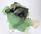 Triclinic crystals of babingtonite with prehnite, from Qiaojia, China 8202M-babingtonite.jpg