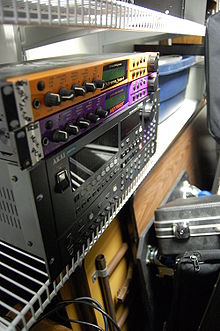 Two Proteus modules, the Xtreme Lead-1 and the Mo-Phatt, sit atop an Akai multi-track recorder, together forming a system typical of Hip hop production AKAI DR16 and E-mu (Xtreme Lead-1, MoPhatt).jpg