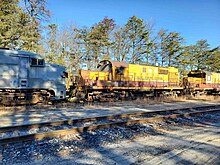 Erie Mining Company 301 & 302 (Renumbered to 7201 & 7202 by ALGX) rotting away on a WW Deadline in Dividing Creek, NJ in 2022 ALGX 7201.jpg