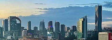 Skyline of Addis Ababa, Ethiopia, showing the city's numerous buildings and skyscrapers, including the Commercial Bank of Ethiopia Headquarters at the top-right.