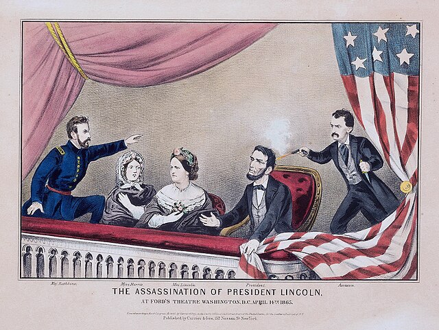 Sebuah gambaran hitam-putih dari lima orang, dua wanita dan tiga pria, yang paling kanan menembakkan pistol ke seorang pria yang duduki di sebelahnya