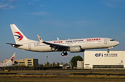 China Eastern Yunnan Airlines Boeing 737 MAX 8 in the standard China Eastern Airlines livery, with 云南公司 (Yunnan Company) written on the rear in reverse.