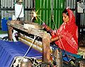 Woman weaving, Bangladesh