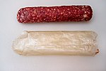 A salami and the collagen casing (below) it came in Beretta Salami and Collagen Casing .jpg