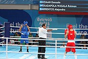 Deutsch: Boxen bei den Olympischen Jugendspielen 2018 Tag 12, 18. Oktober 2018 - Kampf um Bronze im Leichten Weltergewicht Jungen – Hassan Azim (Großbritannien, rot) schlägt Mohammed Boulaouja (Marokko, blau) RSC; Ringrichter ist Wulfren Olivares Peréz (Kolumbien). English: Boxing at the 2018 Summer Youth Olympics on 18 October 2018 – Bronze Medail Match Light Welterweight Boys - Hassan Azim (Great Britain, red) beats Mohammed Boulaouja (Morocco, blue) RSC; Referee is Wulfren Olivares Peréz (Columbia). Español: Boxeo en los Juegos Olímpicos Juveniles de Verano de 2018 en 18 de octubre de 2018 - Medalla de bronce de los hombres ligeros de peso welter: Hassan Azim (Gran Bretaña, rojo) vence a Mohammed Boulaouja (Marruecos, azul) RSC; El árbitro es Wulfren Olivares Peréz (Colombia).