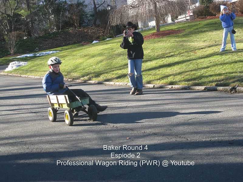 File:Boy riding wagon in New York.JPG