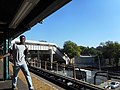 The pedestrian bridge and stairs between the BMT Jamaica Line...