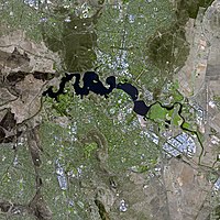 Satellite view of Australia's capital city, Canberra, whose name comes from a Ngunawal language word meaning "meeting place". Canberra SPOT 1088.jpg