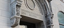 Stone building with ornate pediment that says Architects & Engineers Building