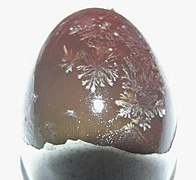 Century egg showing snow-flake/pine-branch (松花, sōnghuā) patterns. These patterns are dendrites of various salts.