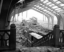Destruction at the Gare Maritime at Cherbourg. The round objects in the carriage are naval mines. Cherbourg 1944-Gare Maritime-Interieur.jpg