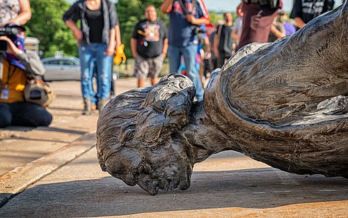 The fallen Christopher Columbus statue outside the Minnesota State Capitol after a group led by American Indian Movement members tore it down in St. Paul, Minnesota, on June 10, 2020.