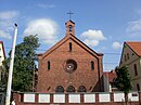 Catholic Christ Church with parish and school house including enclosure