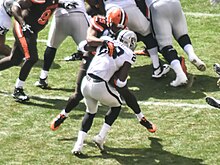 Murray playing against the Browns in 2015 Cleveland Browns vs. Oakland Raiders (21178719964).jpg