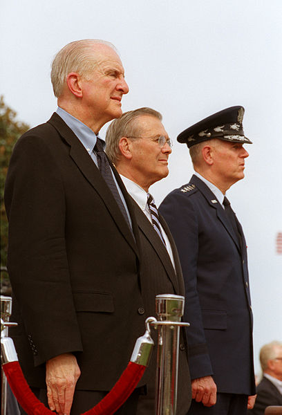 Congressman Sam Johnson with Secretary of Defense Donald Rumsfeld and Chairman of the Joint Chiefs of Staff General Richard B. Myers watch the troops 