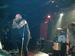 Clark performing with Demon Hunter in 2014 Demon Hunter2.jpg