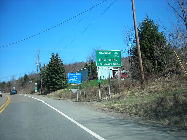 Entering New York on PA 14 northbound. The first reference and reassurance markers for NY 14 are visible here.