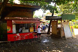 Streetcorner in downtown Guihulngan Guihulngan scene - Flickr.jpg