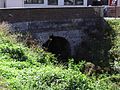 Point de disparition sous un pont ancien marquant l'entrée de Gaillon.