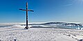 * Nomination Summit cross on the Himmeldunkberg. In the background on the right the Kreuzberg --Milseburg 11:05, 3 February 2024 (UTC) * Promotion  Support Good quality. --GoldenArtists 17:56, 3 February 2024 (UTC)