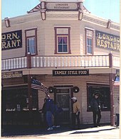 The Longhorn Restaurant is located in what used to be the Bucket of Blood Saloon, the Holiday Water Company, and the Owl Cafe and Hotel. Virgil Earp was shot from the second floor while the building was under construction. Historic Longhorn Restaurant.jpg
